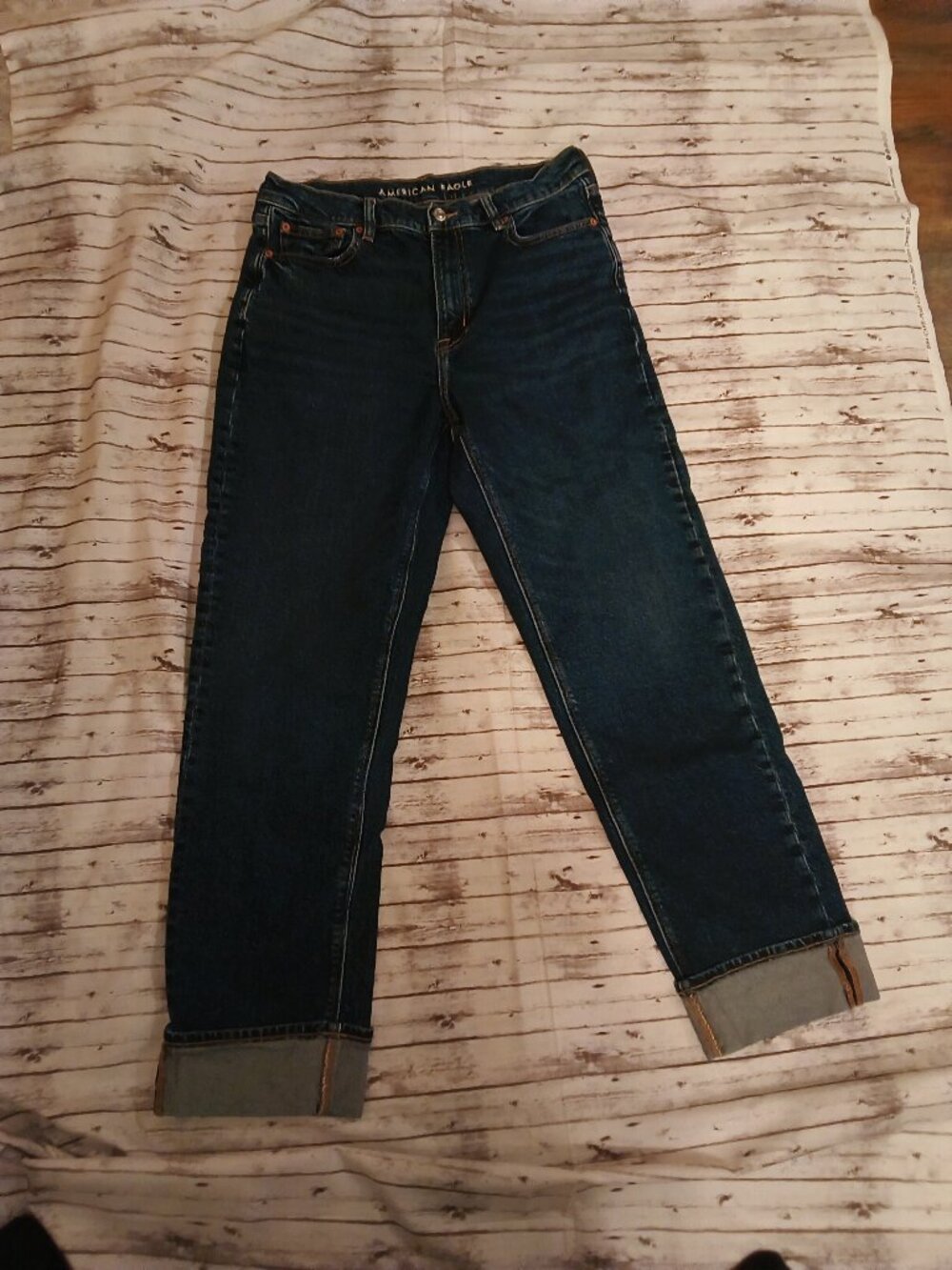 American Eagle super high straight leg blue jeans.